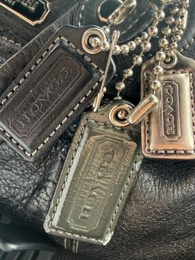 Coach Black Leather Bag with Silver and Bronze Logo Charms